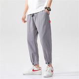 Theo - Fitted Cotton Trousers